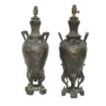 A Pair of early 20th century bronze Lamp bases in the Chinese Style