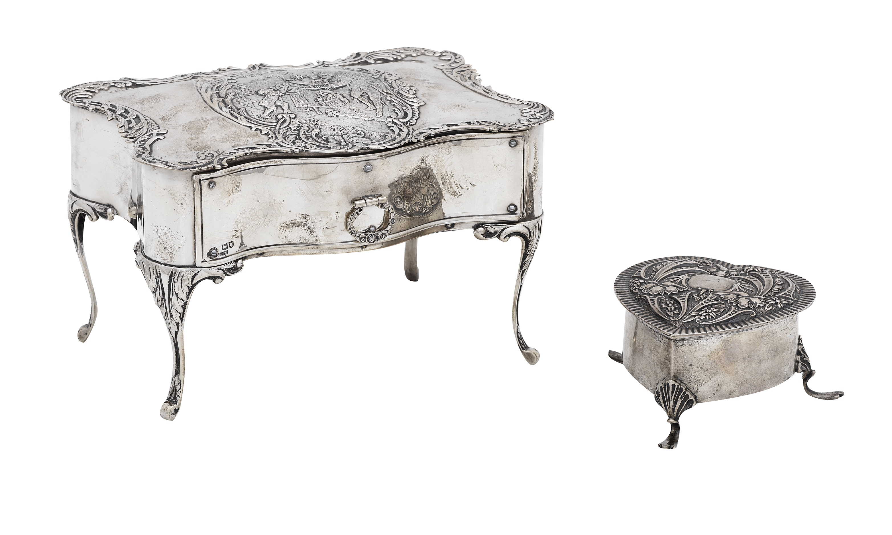 An Edwardian rococco silver jewellery casket, maker's mark WC, London, 1901, (2)