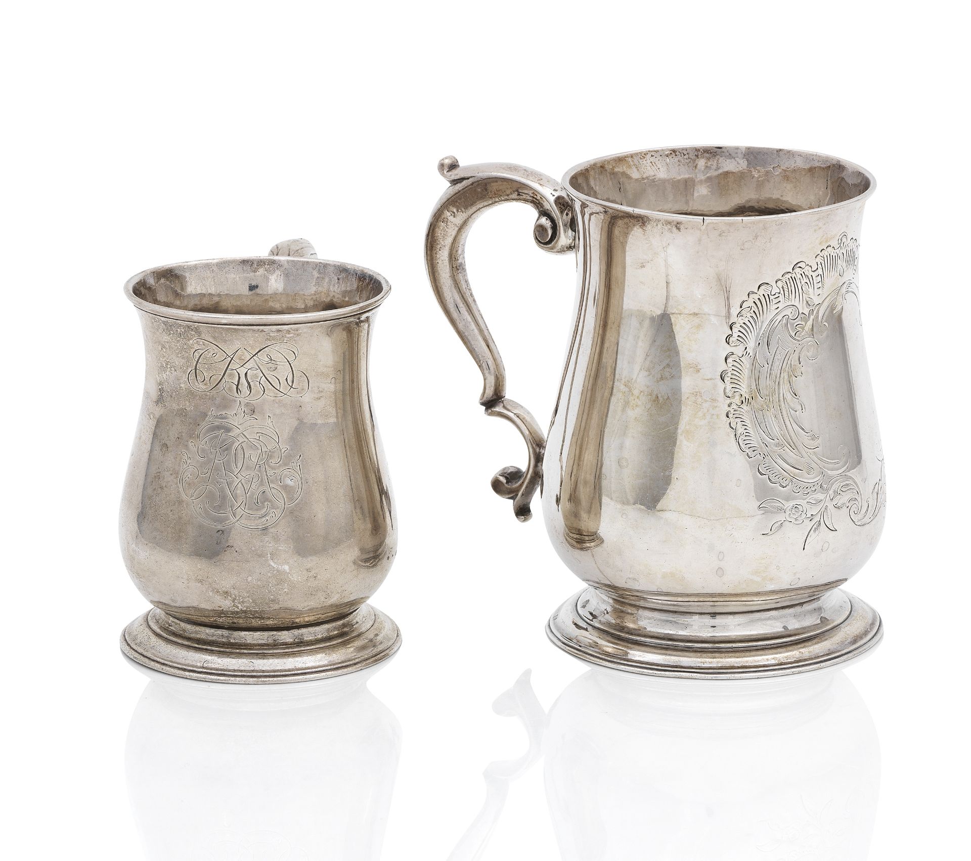 Two George III silver baluster mugs the larger by Richard Gurney and Thomas Cook, London, 1750 th...