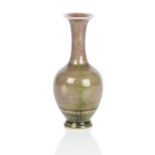 A peach bloom bottle vase Six character Kangxi mark but later