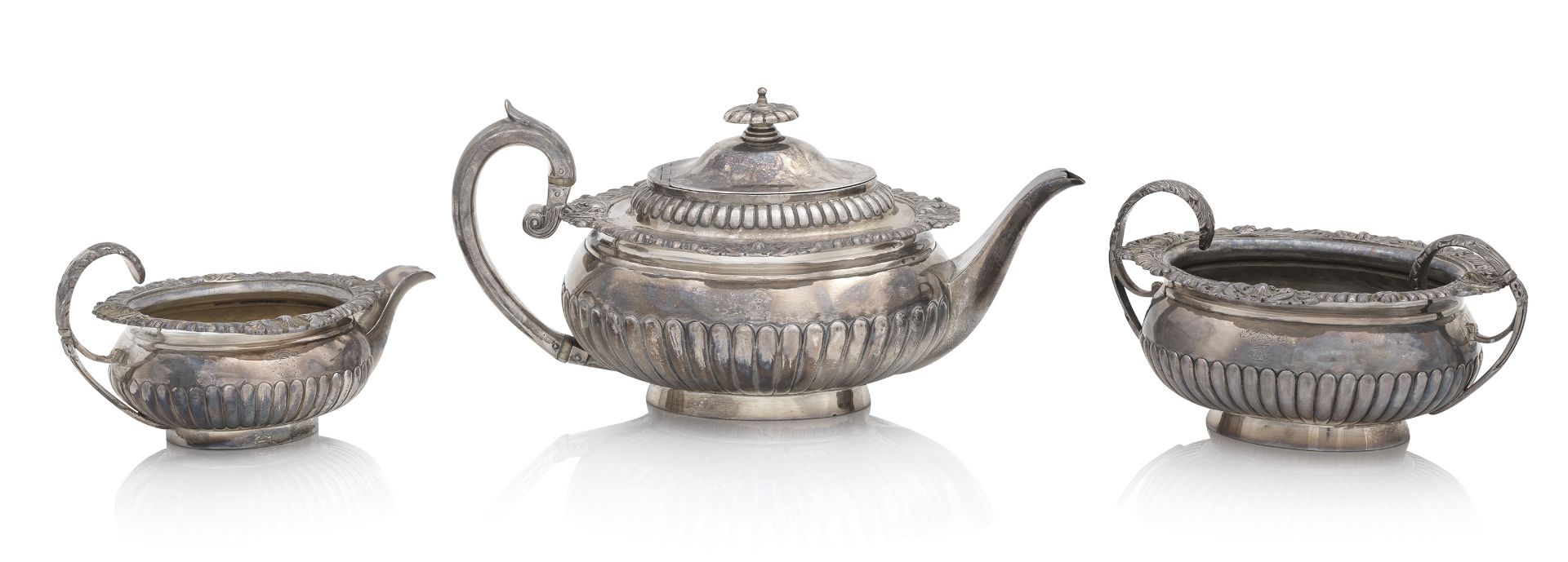 A George III three piece silver tea service by Solomon Hougham, London, 1813