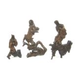 Three rootwood carvings of Daoist Immortals 19th century (5)