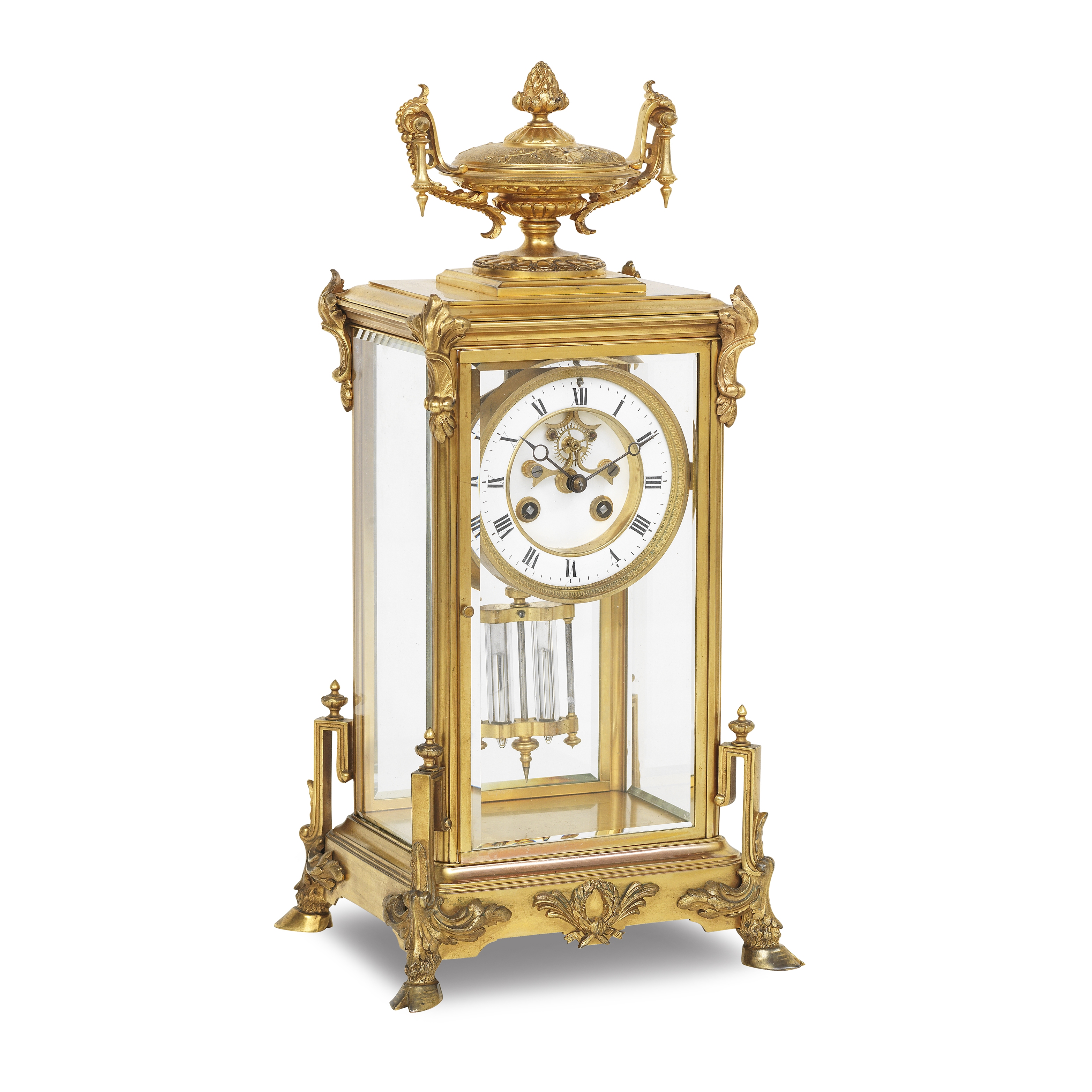 A late 19th/early 20th century ormolu four glass mantel clock
