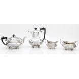 An Edwardian four piece silver tea service maker's mark JD over WD, Sheffield, 1904