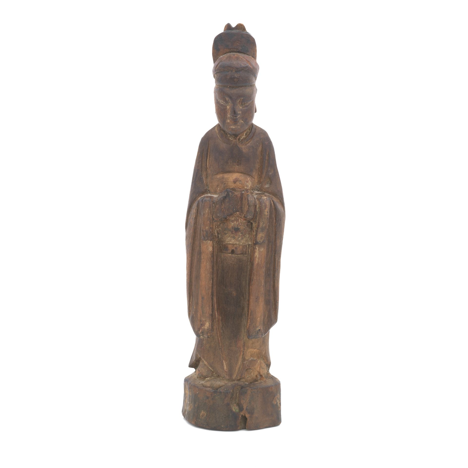 A carved wood figure of a courtier, Probably Ming