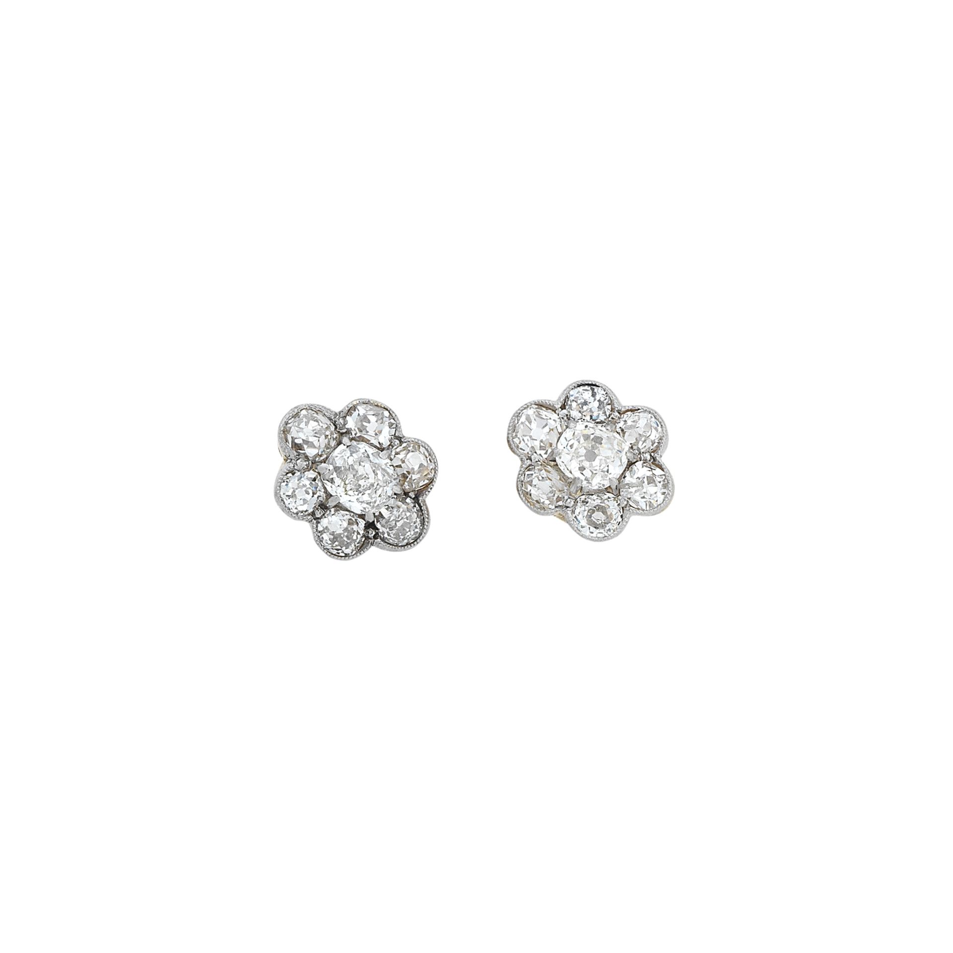 A pair of diamond cluster earrings