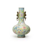 A fine famille rose yellow-ground 'dragon and phoenix' bottle vase