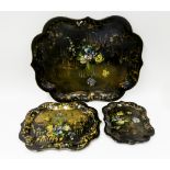 A set of three graduated papier-mâché trays, mid 19th century