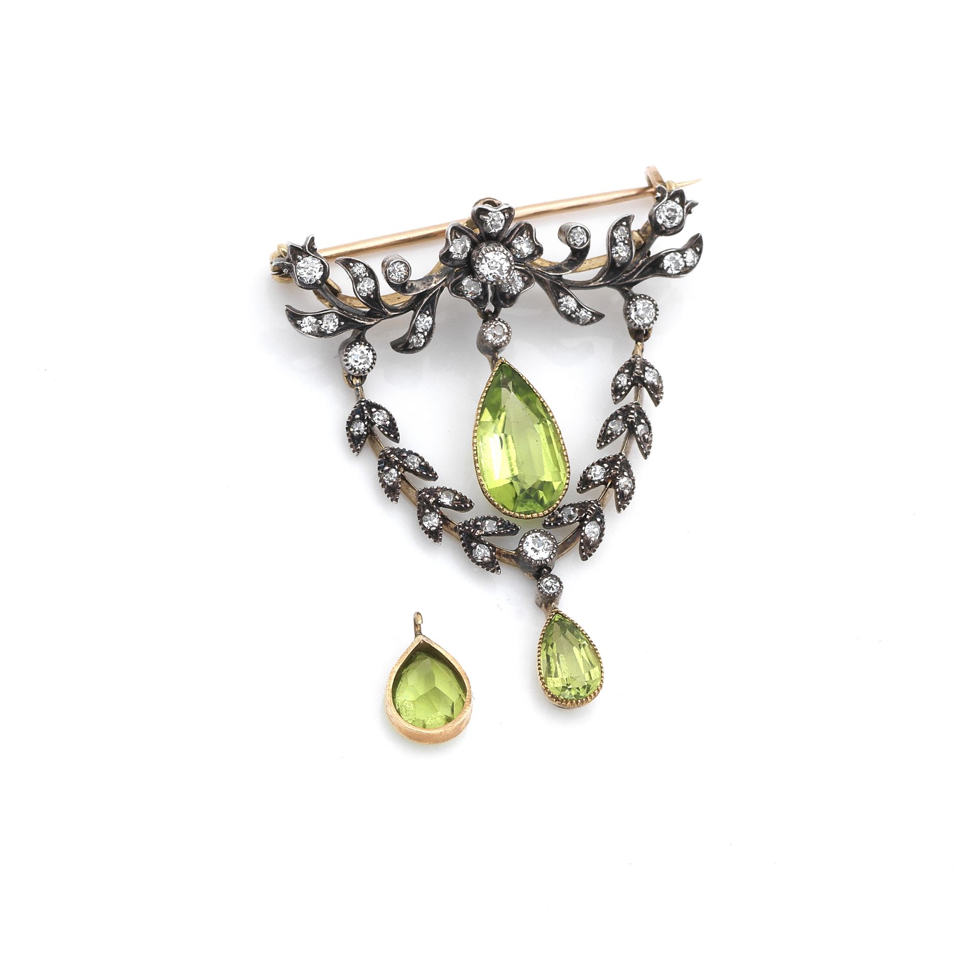 A peridot and diamond pendant, Edwardian