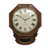 An early 19th century Rosewood and brass inlaid wall clock The dial insribed Bennett of Greenwich