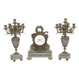 A 19th century French Ormolu and grey marble garniture Inscribed to the dial Deniere Ft De Bronze...