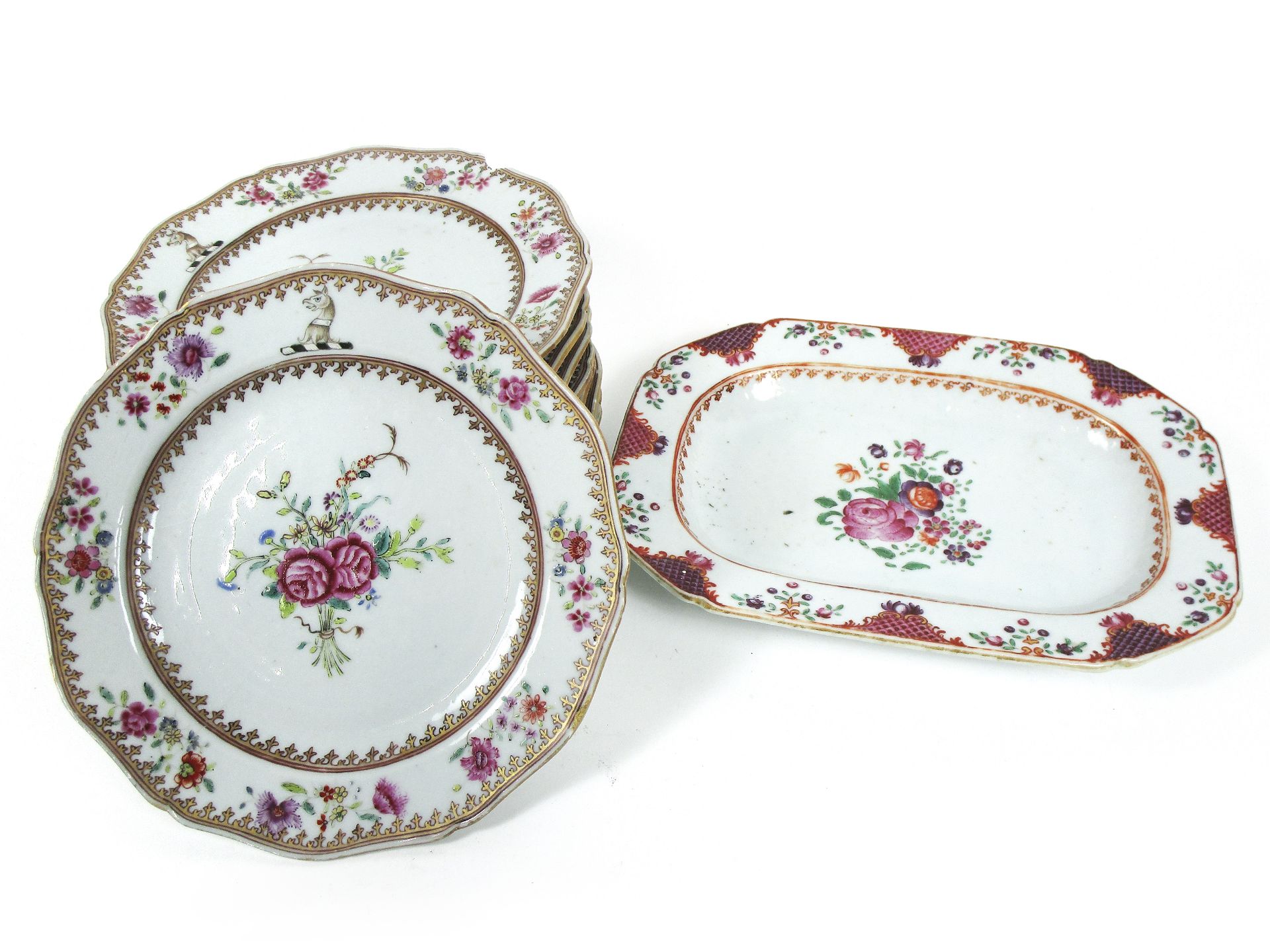 A set of eight small famille rose export plates with the Crabbe family crest and one rectangular ...