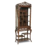 A hongmu faux-bamboo tall display cabinet on stand 19th century