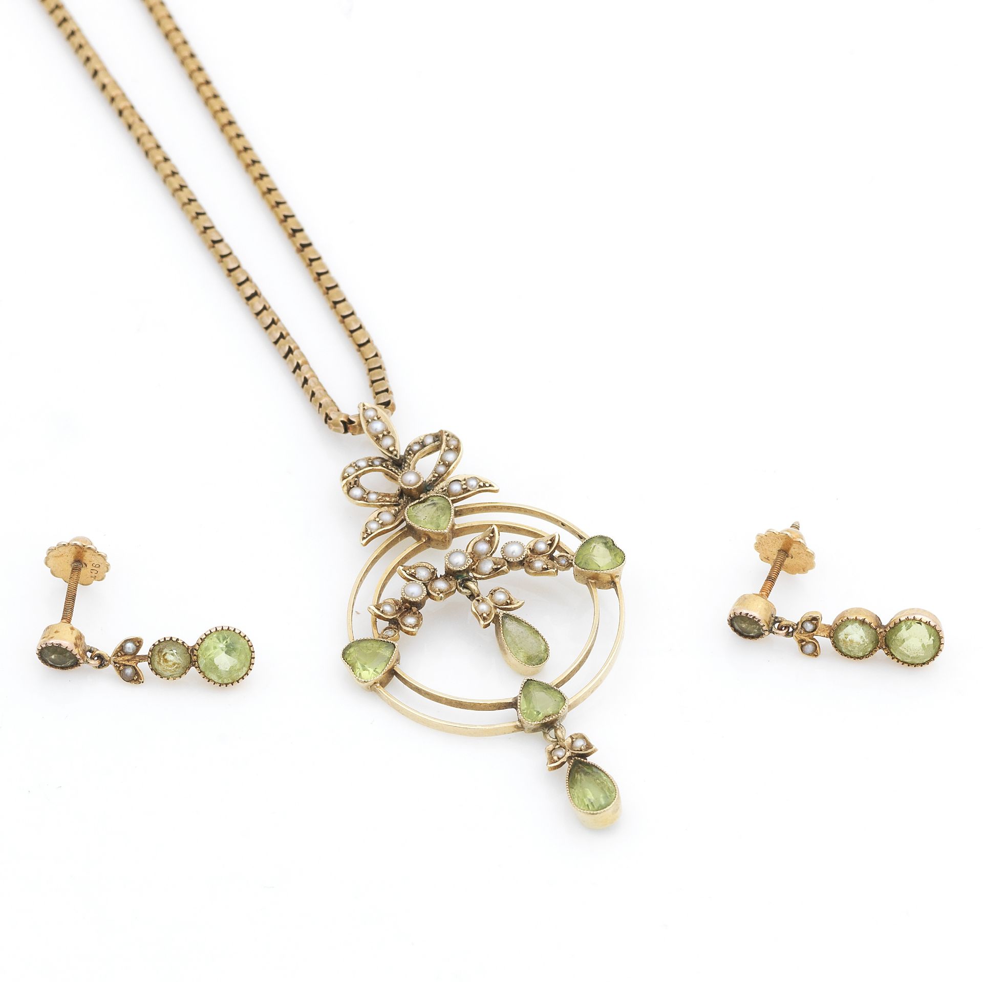 A peridot and seed pearl pendant, with chain and matched pendent earrings (2)