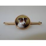 A bar brooch with terrier hand-painted central panel, by W.B. Ford, 1884