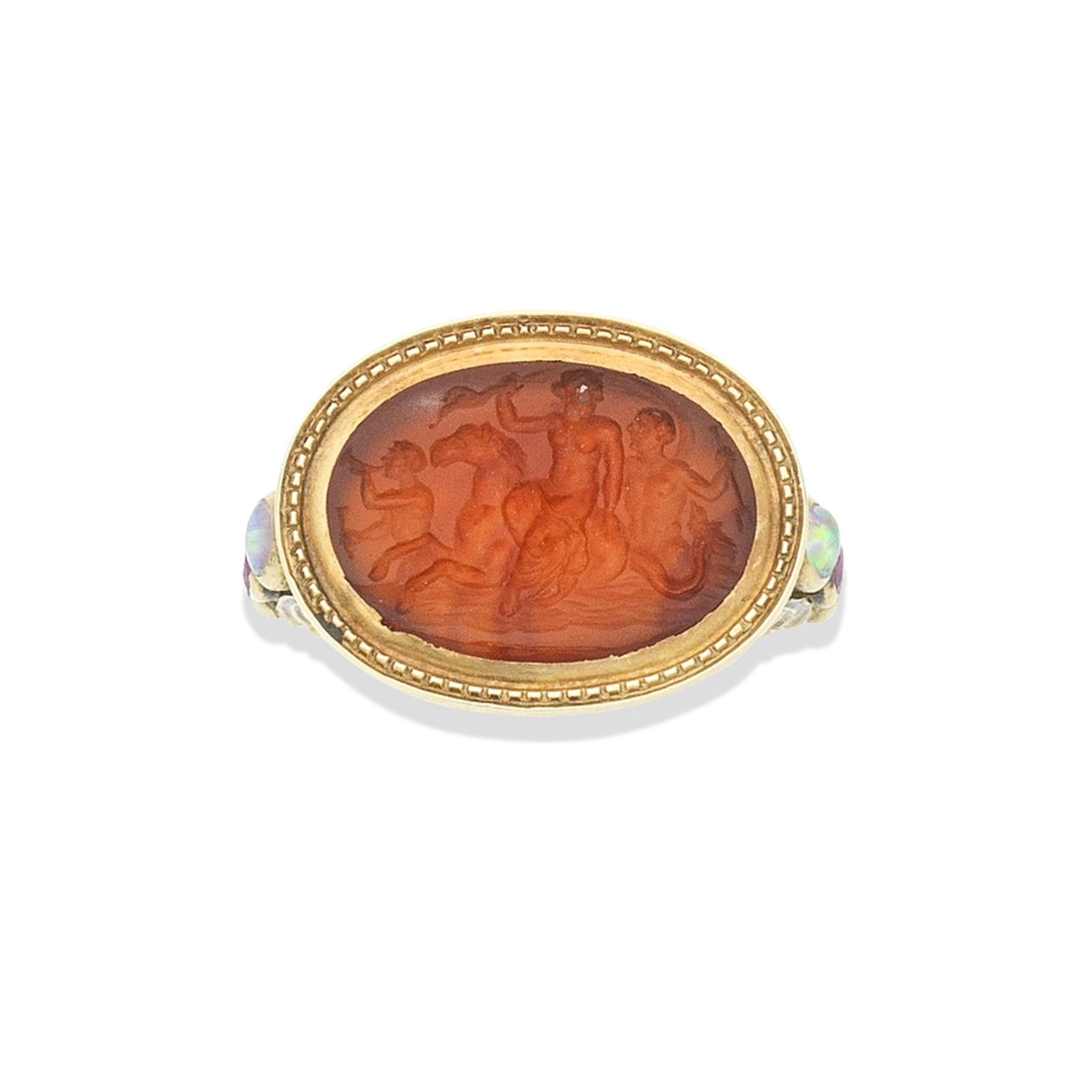 A Roman carnelian intaglio of Venus riding a Hippocamp,