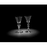 A baluster wine glass and a light baluster glass, circa 1715 and 1745