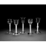 Five opaque twist wine glasses, circa 1760-65