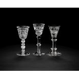 Three engraved wine glasses, second half 19th century