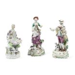 A Derby sweetmeat figure and a pair of Derby figures, circa 1756-65