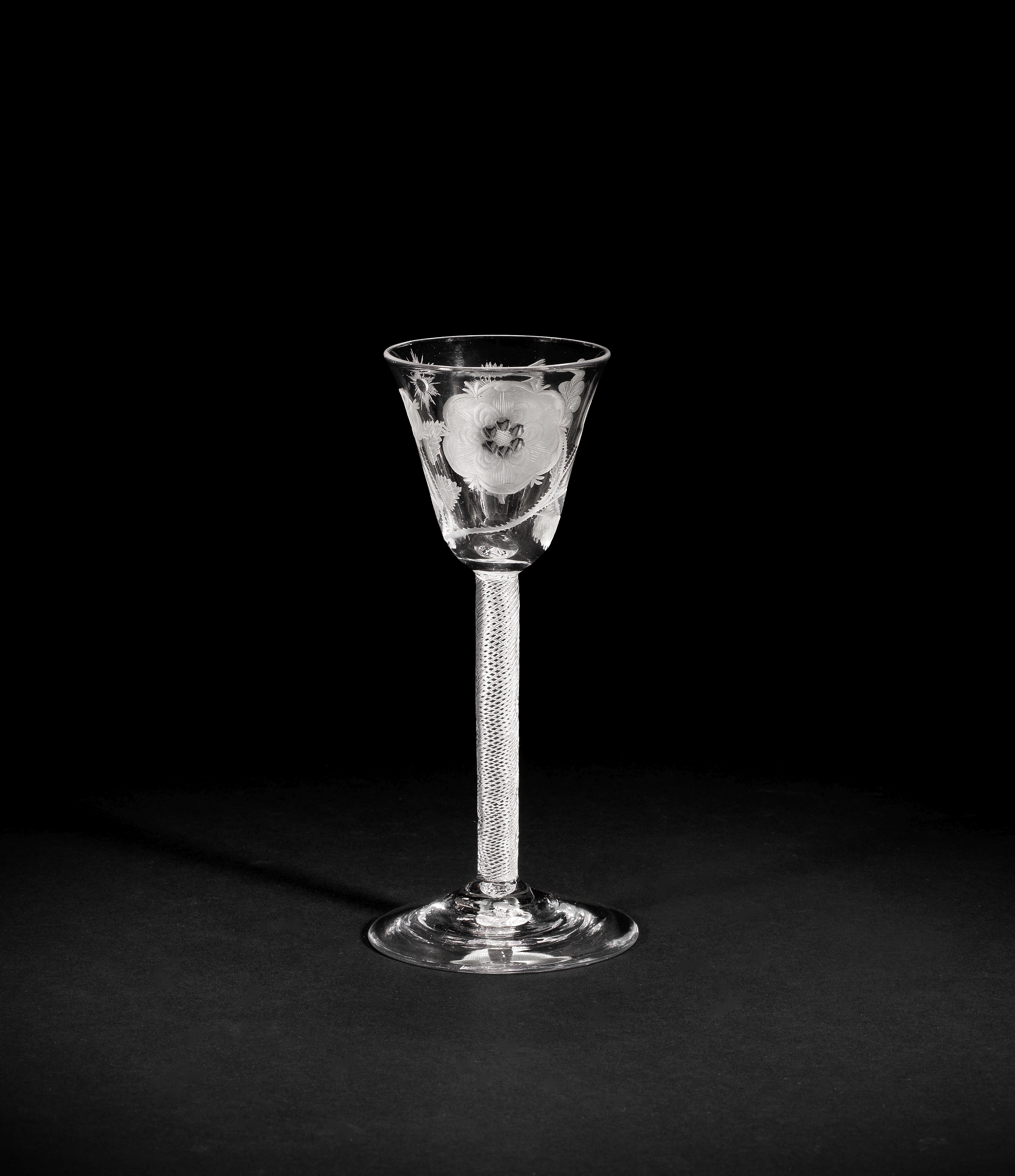 A Jacobite engraved airtwist wine glass, circa 1750