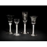 Three opaque twist wine glasses and an ale glass, circa 1765