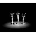 Three glasses with twist stems, mid-18th century