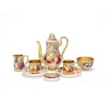 A Royal Worcester 'painted fruit' composite coffee set, dated 1921-22 and 1934-35