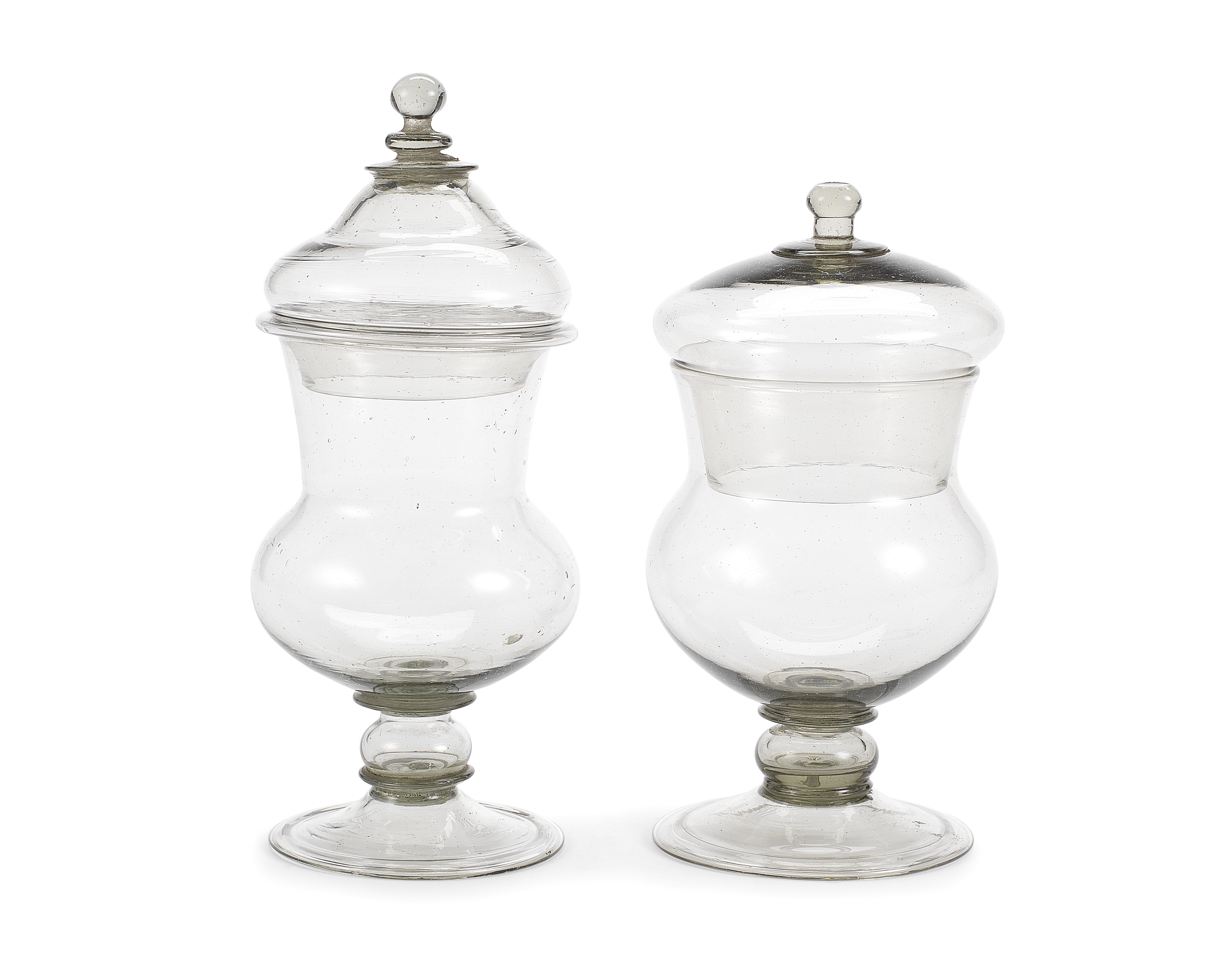 Two pharmacy jars and covers, 17th century