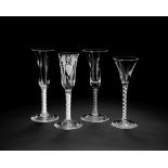 An ale glass, a wine or toasting glass and two wine flutes with twist stems, circa 1750-65