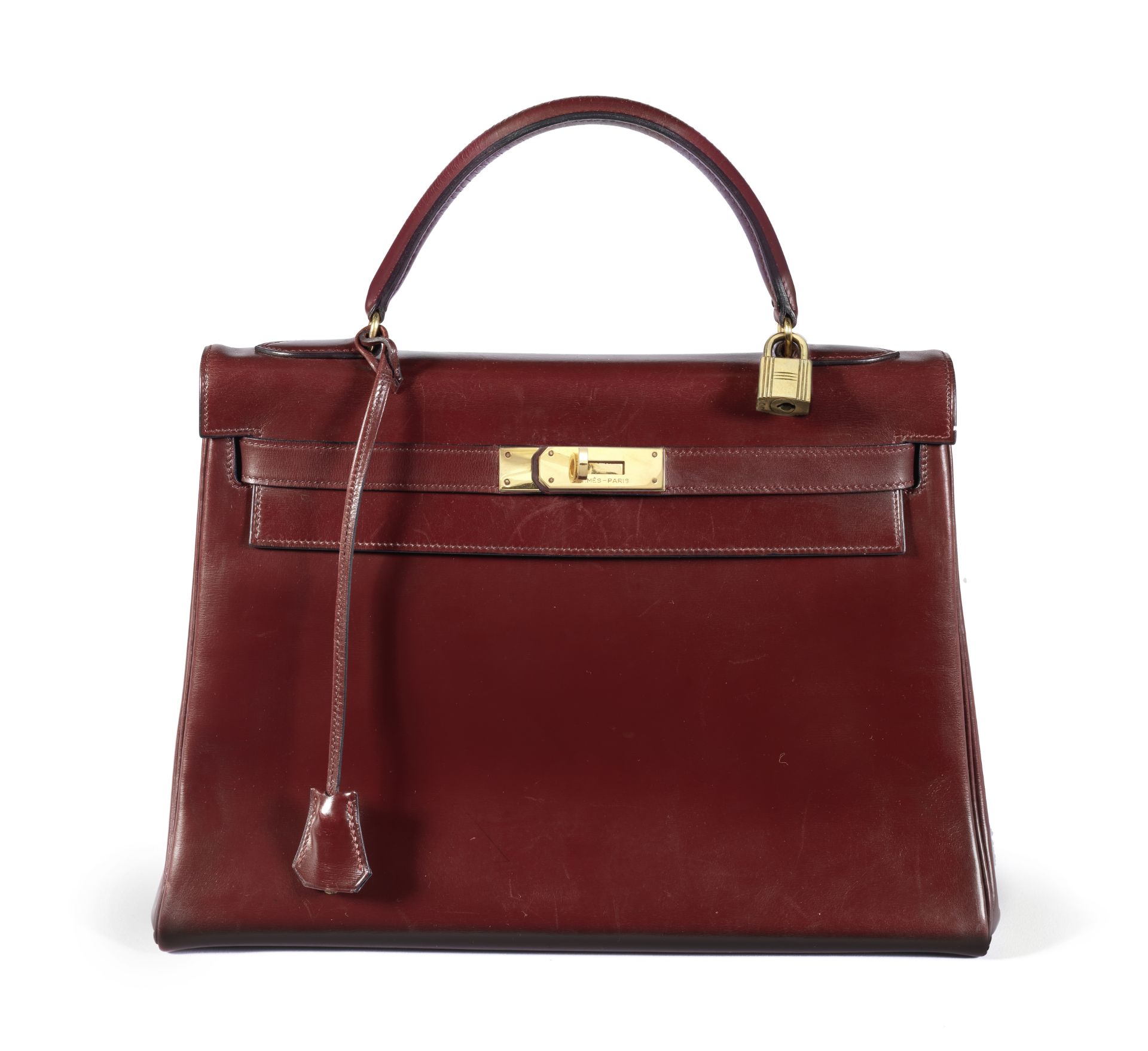 Rouge H Box Kelly Retourne 32, Hermès, c. 1982, (Includes padlock, keys, cloche, and dust bag)