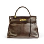 Chocolate Brown Box Kelly Retourne 32, Hermes, c. 1972, (Includes padlock, key, cloche and dust ...