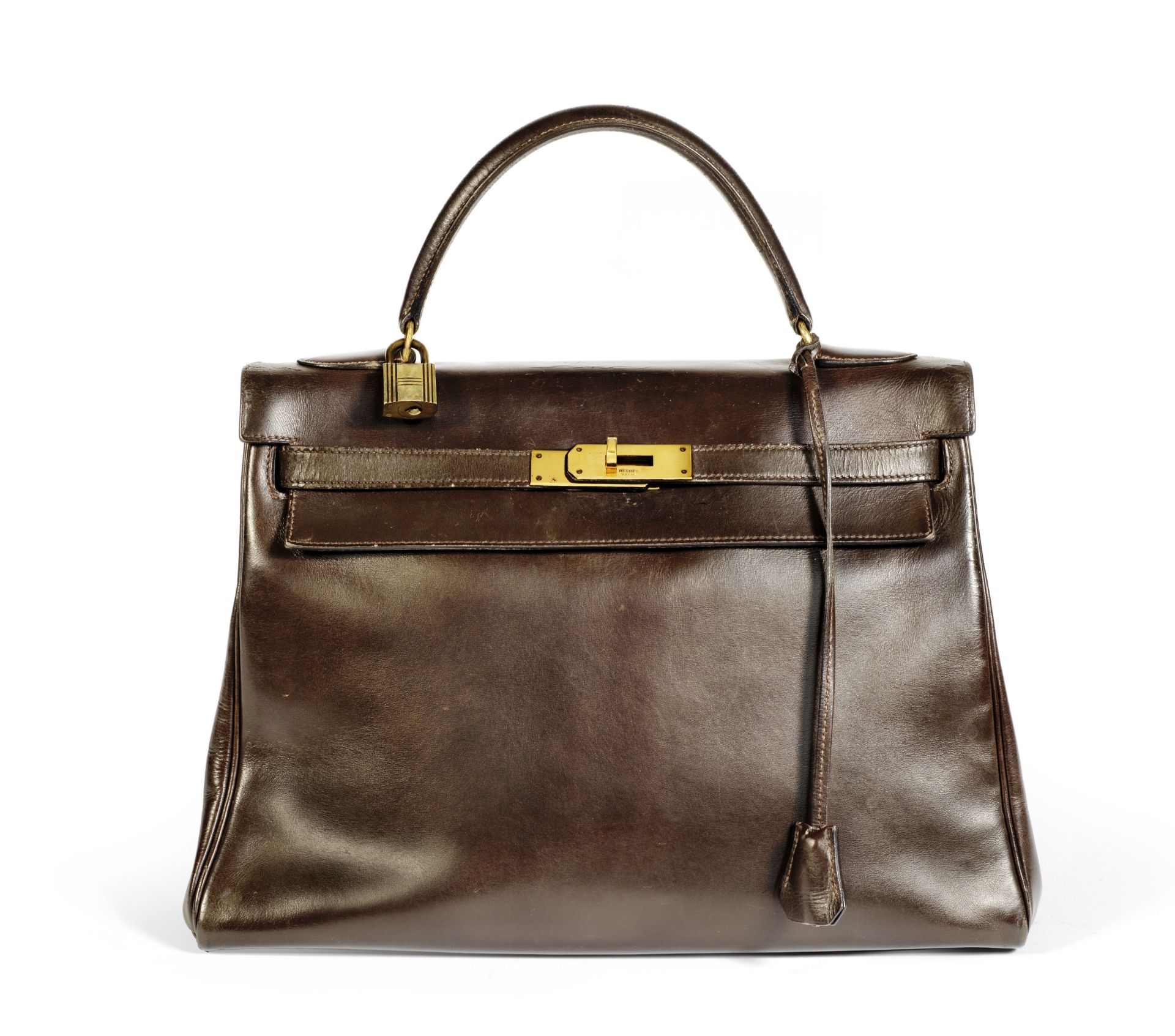 Chocolate Brown Box Kelly Retourne 32, Hermes, c. 1972, (Includes padlock, key, cloche and dust ...