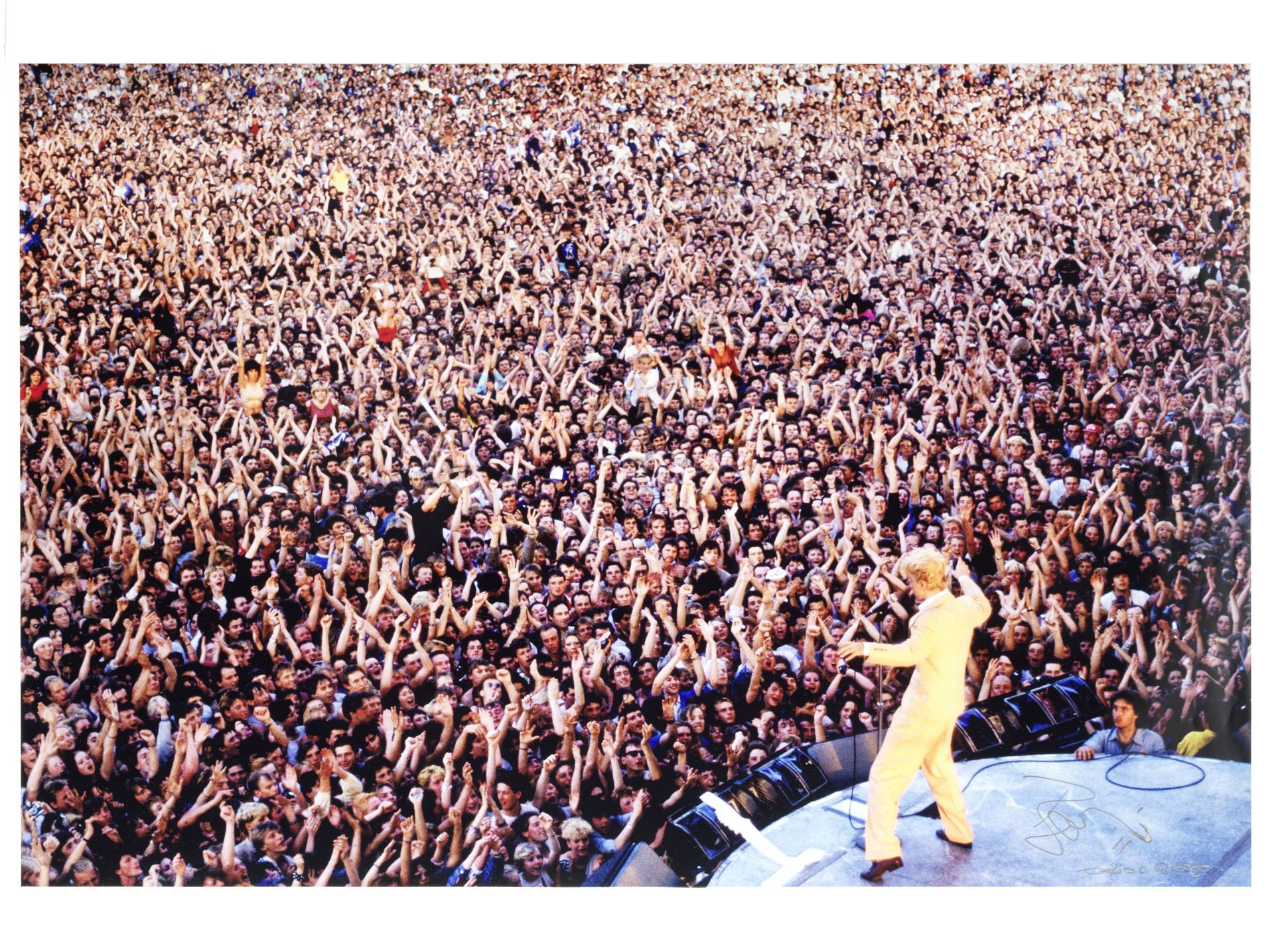 Denis O'Regan (British, b.1953): A signed print of David Bowie, Milton Keynes Bowl, 'Serious Moon...