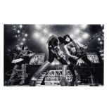 Denis O'Regan (British, b.1953): a black and white print of KISS signed by Gene Simmons, 2008, pr...