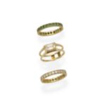 Fancy coloured diamond ring, diamond eternity ring, and emerald eternity ring (3)