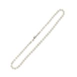 Natural and cultured pearl necklace with diamond clasp