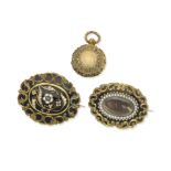 Two mid 19th century gold and enamel mourning brooch/pendants and a gold locket, circa 1830 (3)