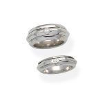 Piaget: Two diamond 'Possession' rings, (2)
