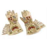 Attributed to Phoebe Anna Traquair HRSA (1852-1936) each glove 33 x 18 cm. (13 x 7 1/16 in.)