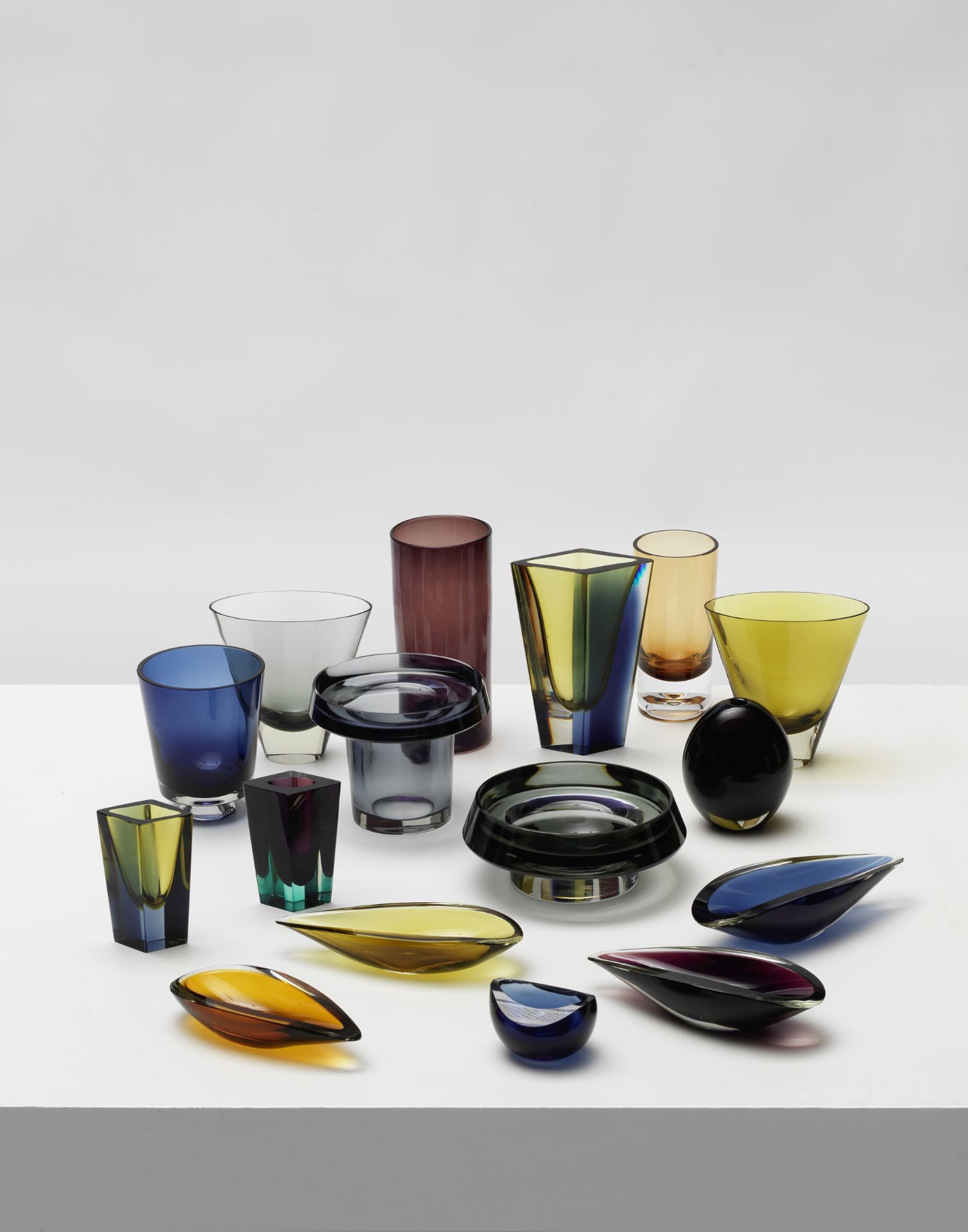 KAJ FRANCK Group of twelve vases and four dishes, model nos. KF 113, 208, 210 (Willowleaf), 212, ...