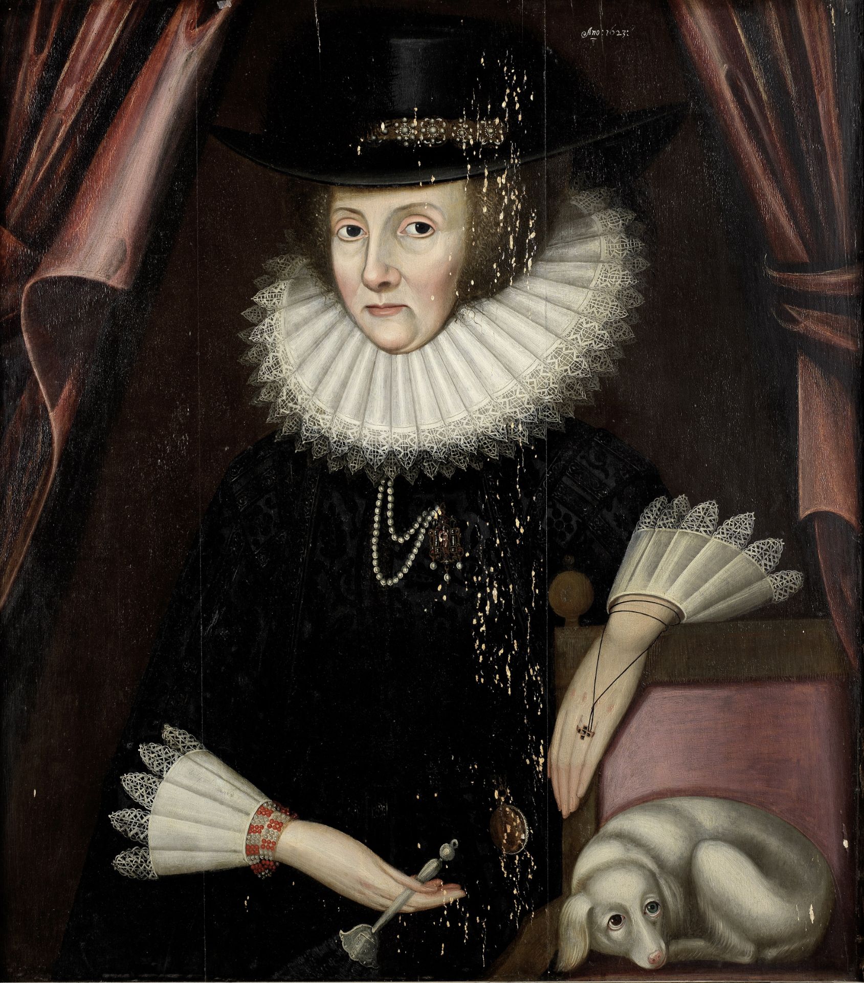 English School, circa 1623 Portrait of a lady, three-quarter-length, with her lapdog