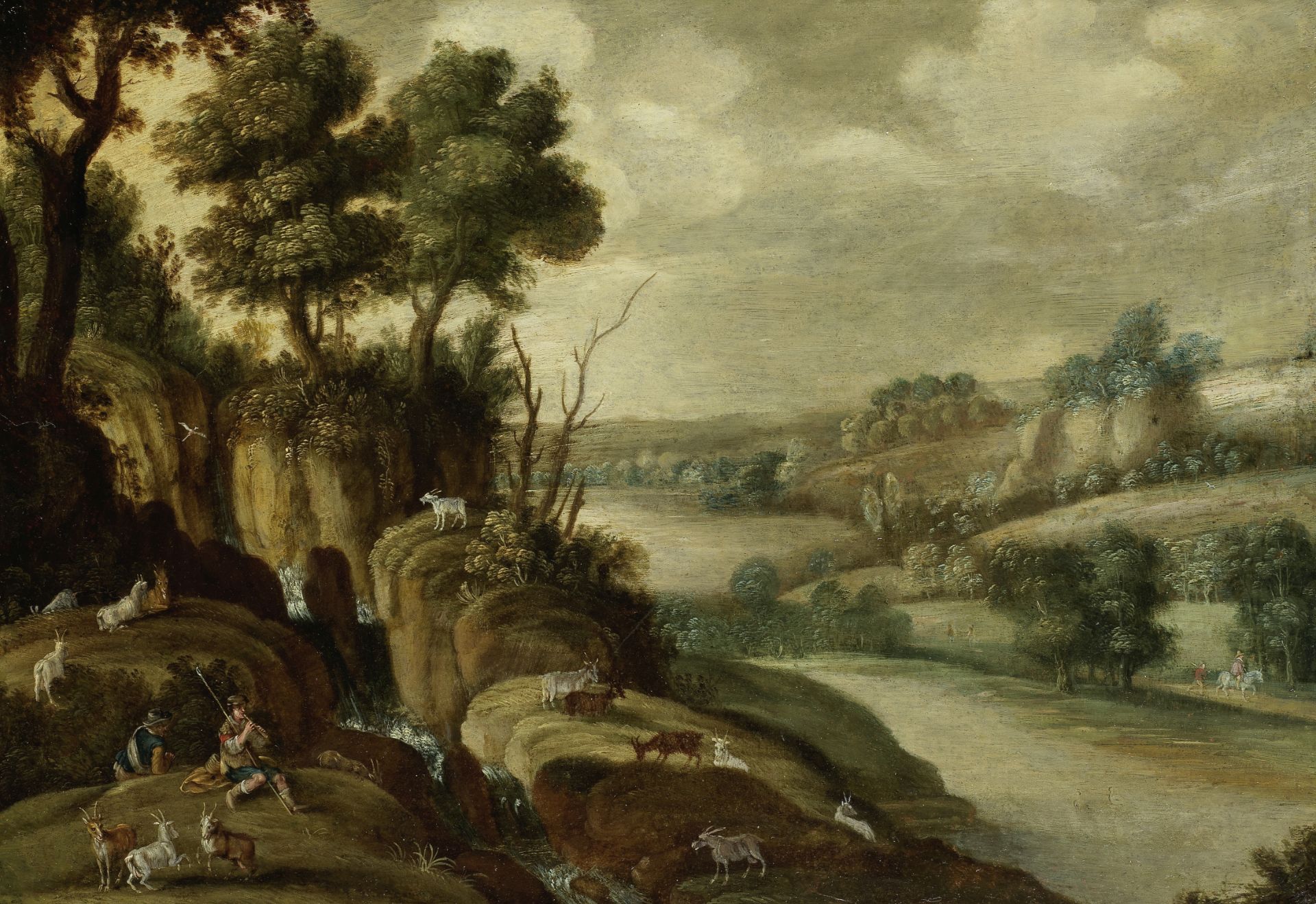 Follower of Marten Ryckaert (Antwerp 1587-1631) A rocky river landscape with goatherds resting