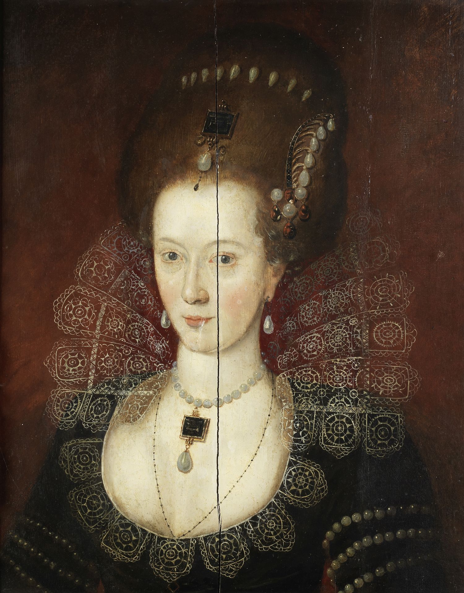 Circle of Robert Peake the Elder (circa 1551-1619 London) Portrait of a young lady, bust-length, ...