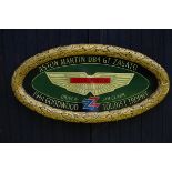 A hand-painted 'Aston Martin DB4 GT Zagato' celebratory oval plaque, ((2))