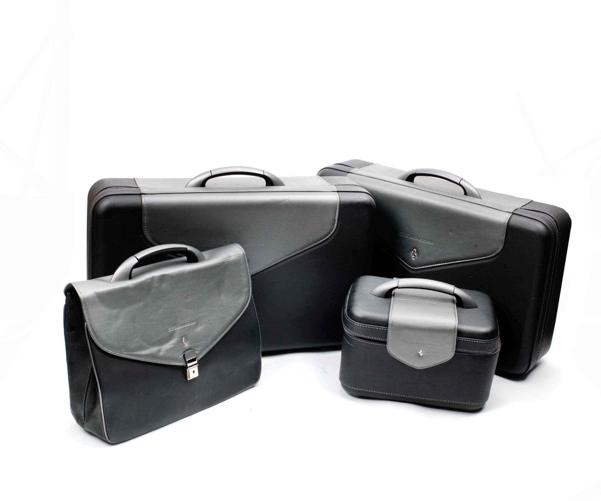 A four-piece set of leather luggage for Ferrari 575M Maranello by Schedoni, Italian, ((8))