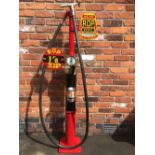 An Avery Hardoll model CH1 one gallon hand-cranked petrol pump