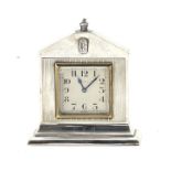 A Rolls-Royce sterling silver desk clock by Saunders & Shepherd, presented as a Christmas gift fo...