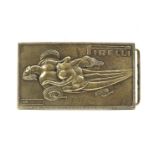 A rare Pirelli belt buckle designed by Salvador Dali (1904-1989), British, circa 1970,