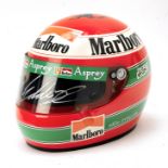 An Eddie Irvine Ferrari promotional helmet by Bieffe, with signed visor,